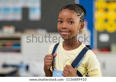 Similar – Image, Stock Photo satisfied child on a balance bike in a helmet. On a sunny summer day.