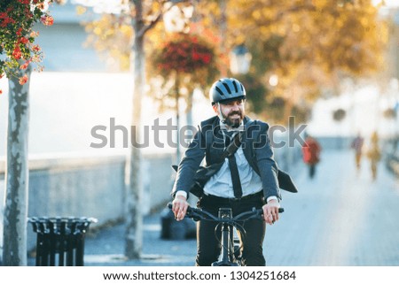 Similar – Image, Stock Photo businessman commuting  in the city