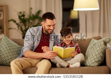 Similar – Image, Stock Photo Father and son reading book together