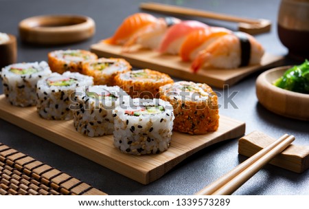 Similar – Image, Stock Photo Delicious Sushi Plates in Restaurant