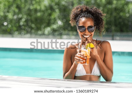 Similar – Image, Stock Photo Cool black woman with Afro braids on street in sunshine