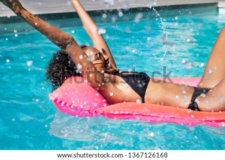 Similar – Image, Stock Photo Smiling women in swimsuits on sandy beach near ocean