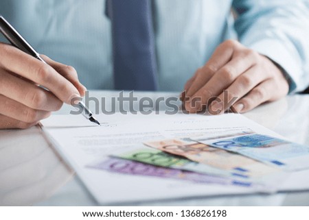 Businessman is signing a contract, business contract details Foto stock © 