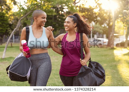 Similar – Image, Stock Photo Two beautiful multiethnic women making selfie and grimacing