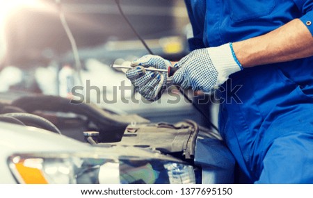 Similar – Image, Stock Photo Male master in workshop with violins