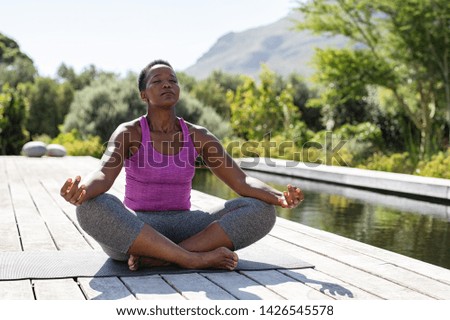 Similar – Foto Bild Serene schwarze Frau in der Nähe von Fenster zu Hause