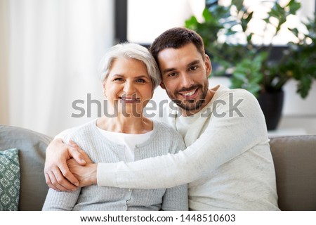 Similar – Image, Stock Photo Young mother embraced a newborn baby boy and kissing him