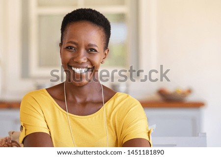 Similar – Image, Stock Photo Smiling black woman sitting on railing