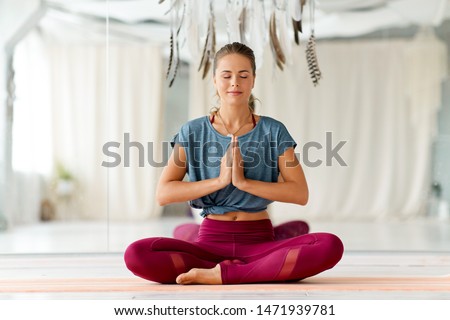 Similar – Image, Stock Photo Woman meditating with namaste hands