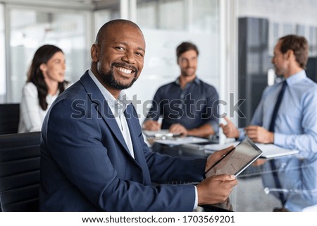 Similar – Image, Stock Photo smiling black man holding his hair in a tail