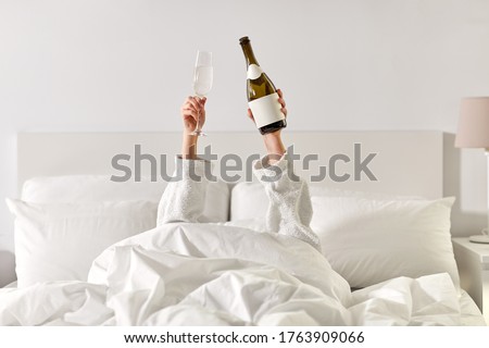Similar – Image, Stock Photo Anonymous young woman drinking coffee in bed