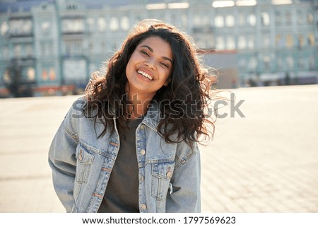 Similar – Image, Stock Photo Cool young woman lighting cigarette standing against amazing landscape of mountain ridge in cloudy weather