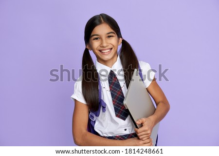 Similar – Image, Stock Photo A teenage girl ties her shoelaces in sneakers, prepares for training