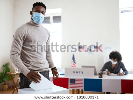 Similar – Image, Stock Photo Black man in mask riding in modern train