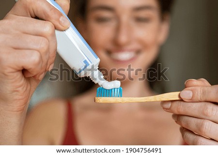 Similar – Image, Stock Photo Wooden toothbrushes with dental floss.