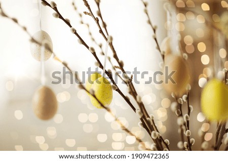 Similar – Foto Bild Ostereier und Weidenzweige auf einem Tisch aus poliertem braunem Onyxstein.