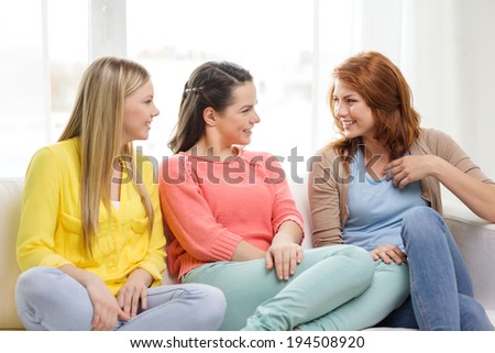 Similar – Image, Stock Photo Three girlfriends having fun taking a selfie