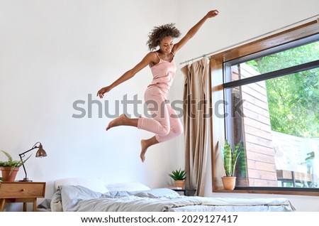 Similar – Image, Stock Photo Excited black woman having fun in park