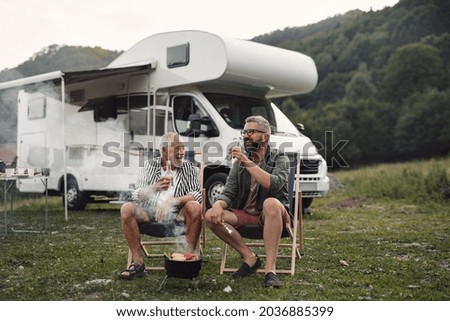 Similar – Image, Stock Photo A old camper with a fancy curtain