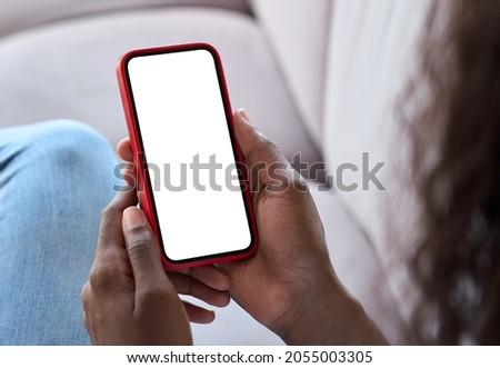 Similar – Image, Stock Photo woman holding smartphone with blurred sky background