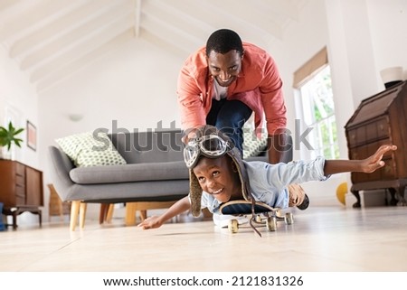 Similar – Image, Stock Photo Boy lying on a sofa using the laptop