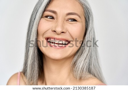 Similar – Image, Stock Photo Senior lady looking away from boardwalk