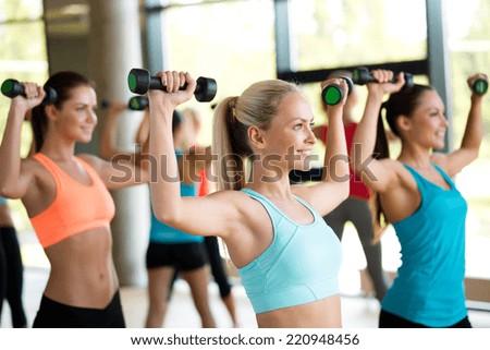 Similar – Foto Bild Frau Training mit Hanteln im Fitnessstudio