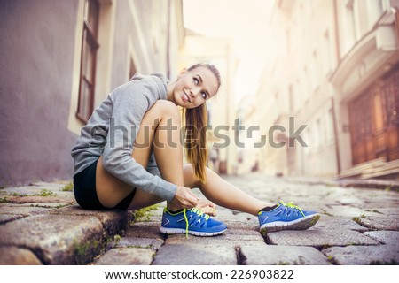 Similar – Image, Stock Photo Sporty young female runner in the forest.