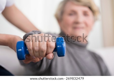 Similar – Image, Stock Photo rehabilitation therapy. Hands treating a young woman’s shoulder