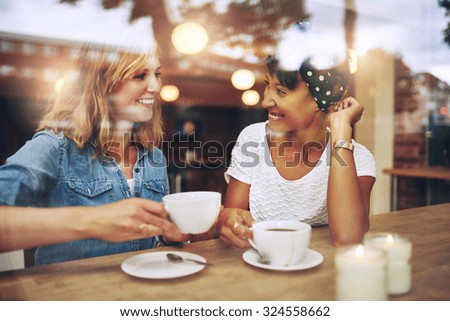 Similar – Image, Stock Photo Ethnic friends relaxing together in city