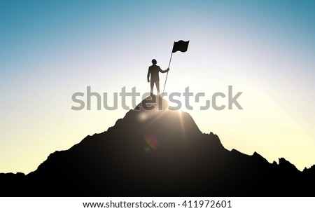 business, success, leadership, achievement and people concept - silhouette of businessman with flag on mountain top over sky and sun light background Foto d'archivio © 