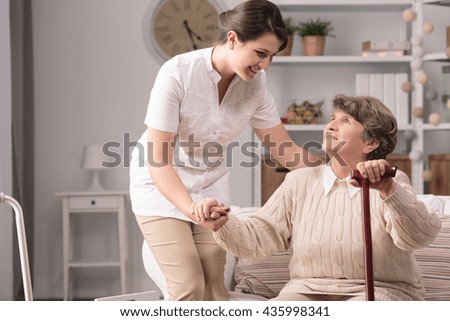 Similar – Image, Stock Photo Woman helping senior woman dress in her bedroom