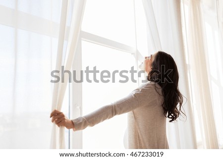 Similar – Foto Bild Frau am Fenster