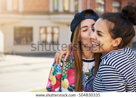 Similar – Image, Stock Photo Two women kissing