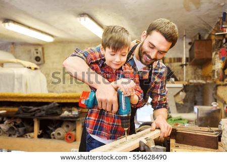 Similar – Image, Stock Photo Male woodworker teaching son in workshop