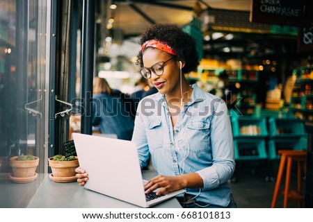 Similar – Foto Bild Selbstbewusste ethnische Frau in dunklem Studio