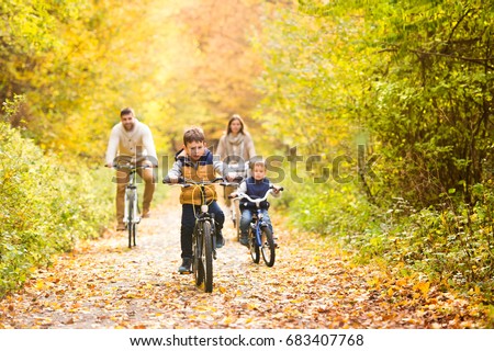 Similar – Foto Bild Junge Familie fahren in einem Lastenfahrrad zusammen