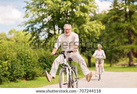 Similar – Image, Stock Photo Happy Joyful senior old white hair woman wearing santa claus hat smiling while using smart phone. stands against a color background. Wearing Christmas clothes. Copy space. Advertising space