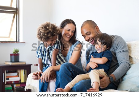 Similar – Image, Stock Photo Happy family with man and woman sitting on the floor with their baby at home terrace, with relax expression.