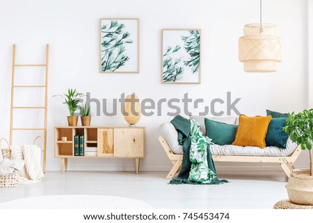 Similar – Image, Stock Photo Vintage sofa in moss green velvet with fringes stands on terracotta tiles. Coziness, old fashioned, past