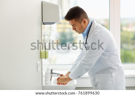 Similar – Image, Stock Photo doctor man washing hands with disinfectant soap. Hygiene and Corona virus Covid-19 concept