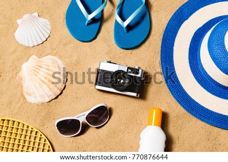 Summer vacation composition. Flip flops, hat and other stuff