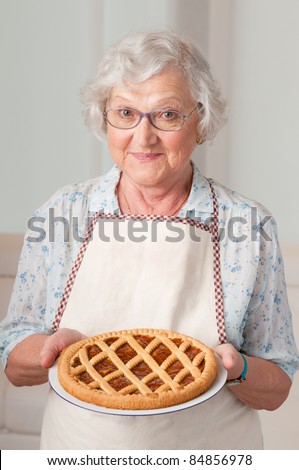 Similar – Image, Stock Photo Apricot pie with one sliced piece. Top view of a lattice crust pie