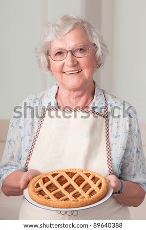 Similar – Image, Stock Photo Apricot pie with one sliced piece. Top view of a lattice crust pie