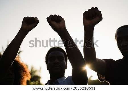 Similar – Image, Stock Photo Peace demonstration against the war of aggression against Ukraine started by Putin. Demonstrator in the national colors of Ukraine holding up a sign. Rear view