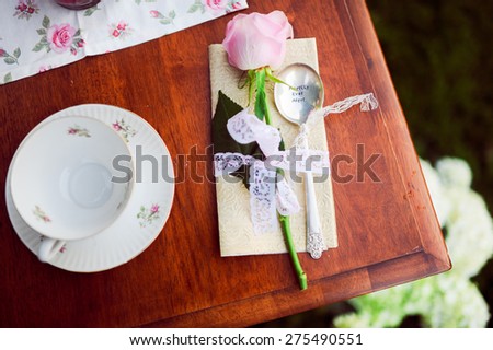 sweet table with flowers and a beautiful colorful and serving sweets to love story and photo shoot