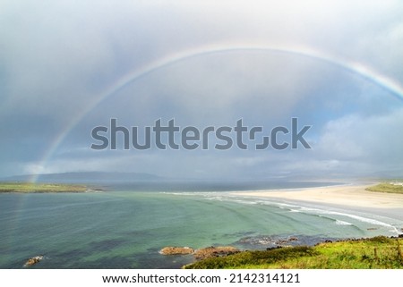 Amazing rainbow above Narin Strand by Portnoo in County Donegal Ireland Stok fotoğraf © 