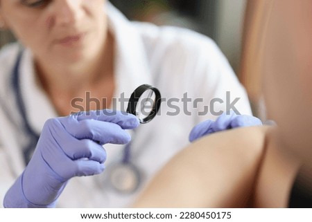 Image, Stock Photo Male doctor examining patient in medical room