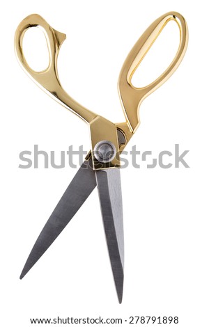 Pair of tailor scissors with metal golden handle isolated on white background.
