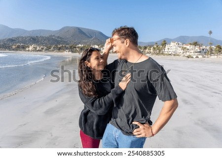 Similar – Image, Stock Photo young heterosexual couple in love embracing each other